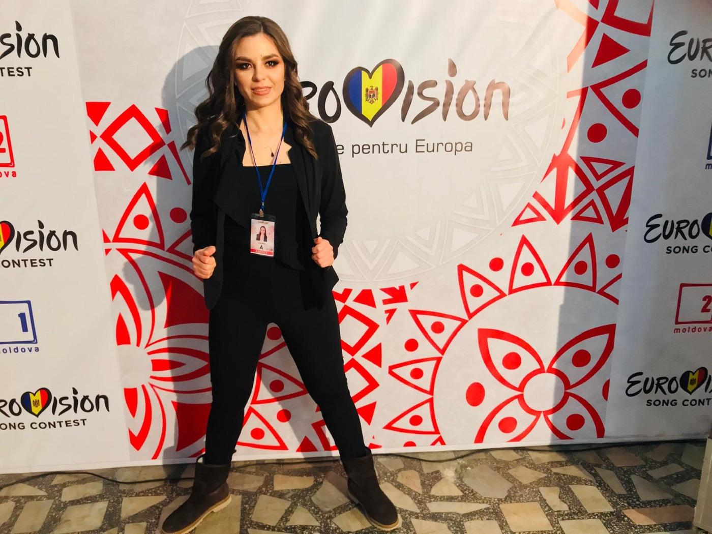 Liuba Doga at a Eurovision Moldova event backdrop